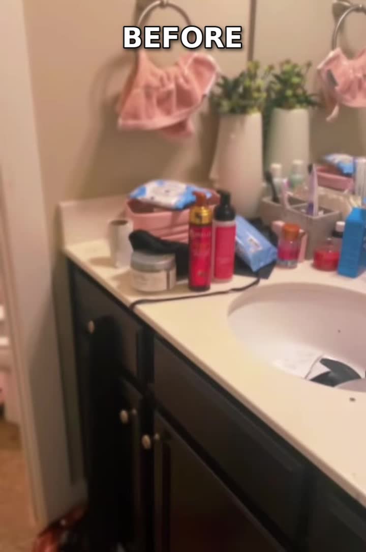 Before: cluttered bathroom vanity and sink, Stone Mountain, GA
